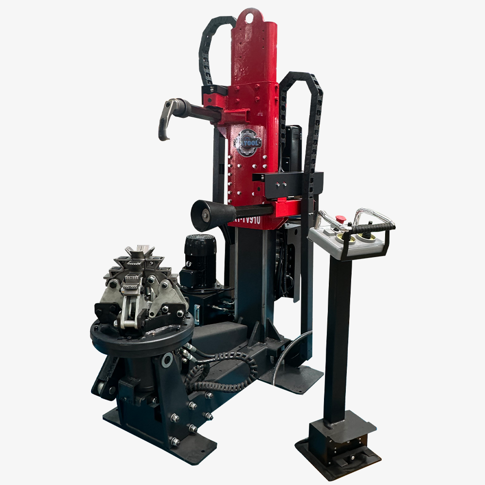 KT-TV910 hydraulic tire changer angled view showing wheel holding assembly
