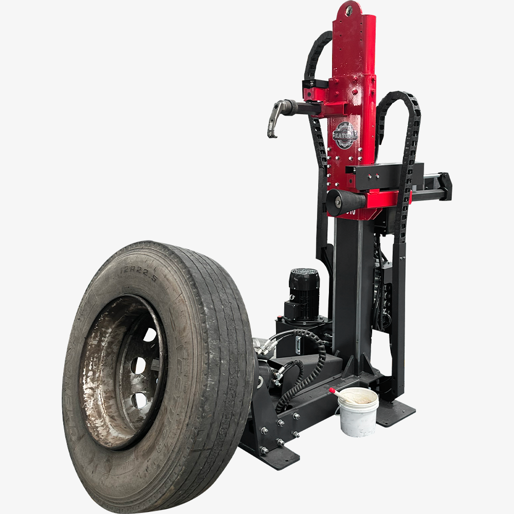 KT-TV910 truck tire changer holding a commercial truck wheel