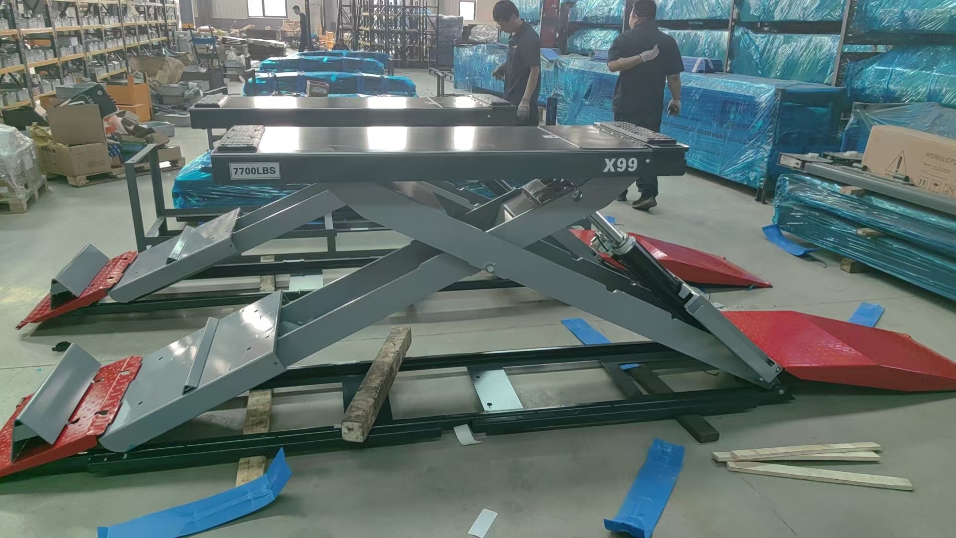 KT-X99 full-rise scissor lift warehouse side view