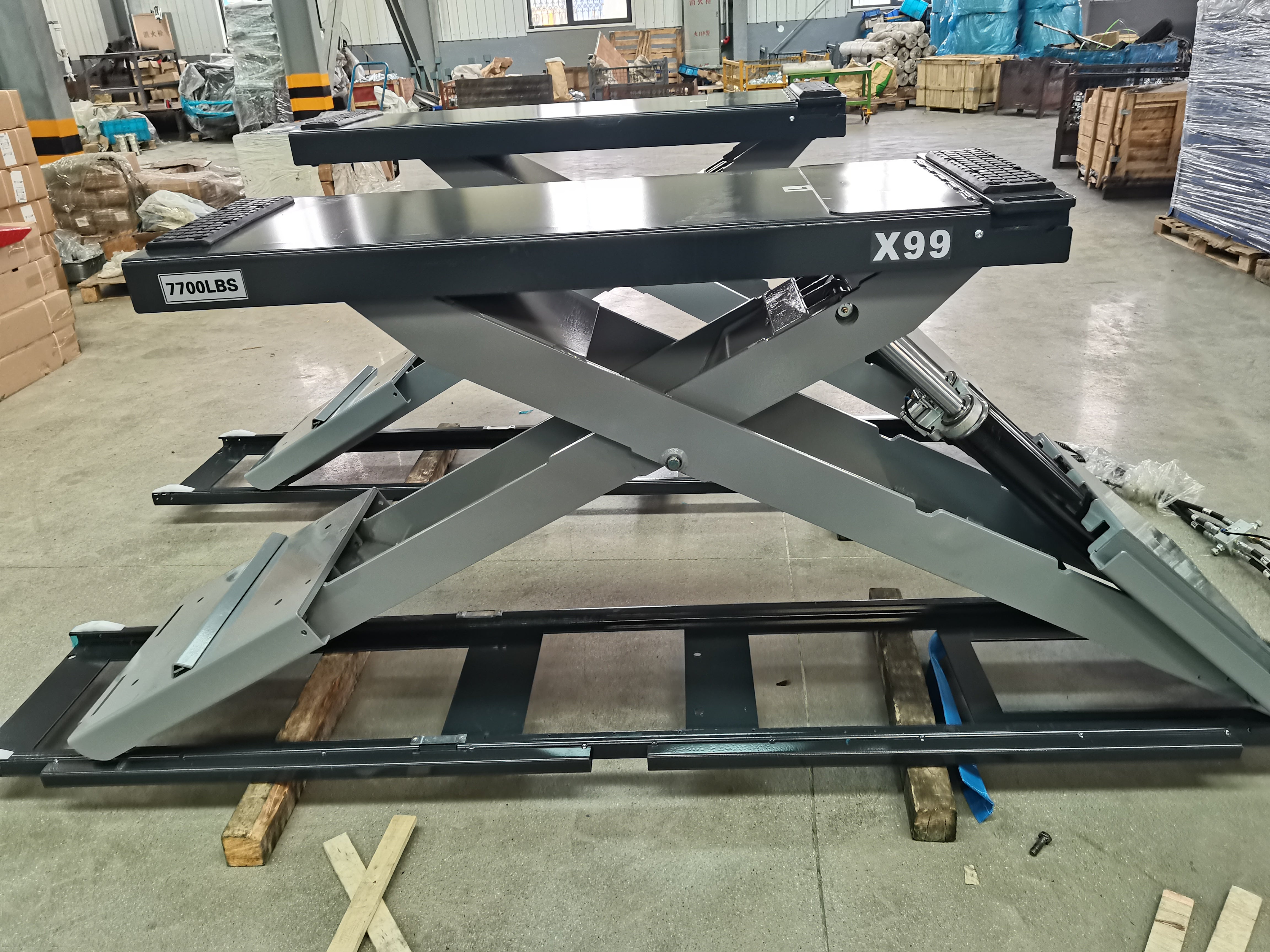 KT-X99 side view of twin scissor assemblies on support frame